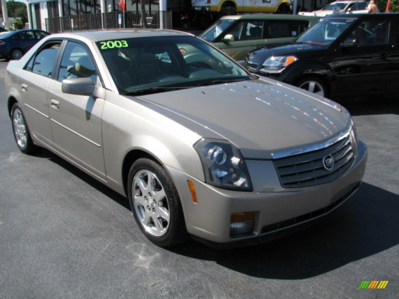 Gold 2003 Cadillac CTS 4 DR with BEIGE LEATHER seats