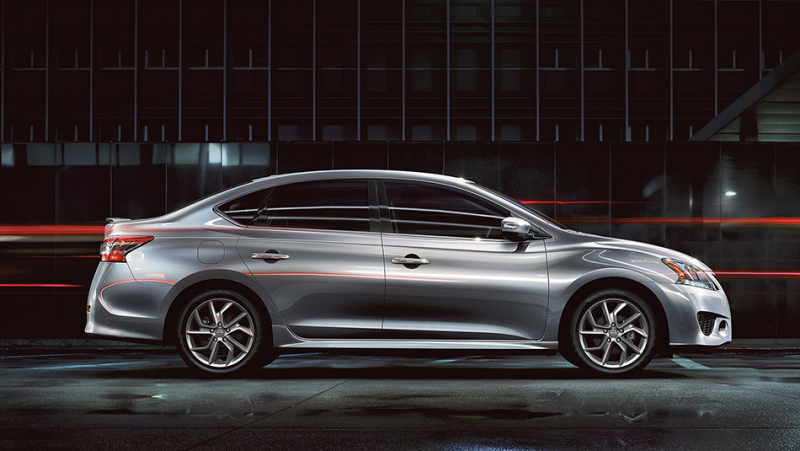 2015 Nissan Sentra shown in Brilliant Silver with black and red ...