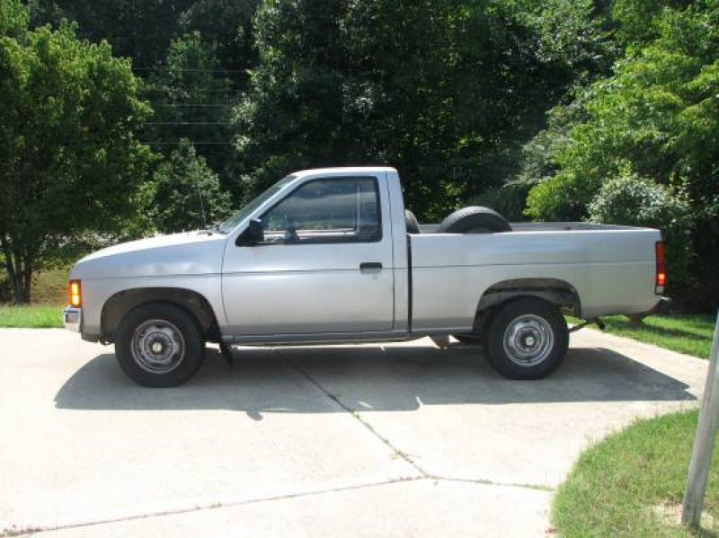 87' nissan pickup, good body, runs strong, 137000, silver with blue ...