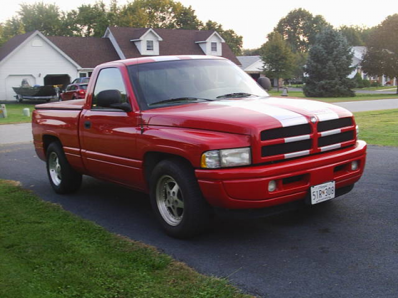 1998 Dodge Ram SS/T Flame Red/Silver, 5.9L V8, auto. 89,XXX miles.