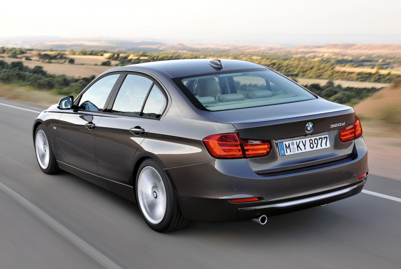 2012 BMW 3 Series Modern Line Rear 3/4 View (Action)