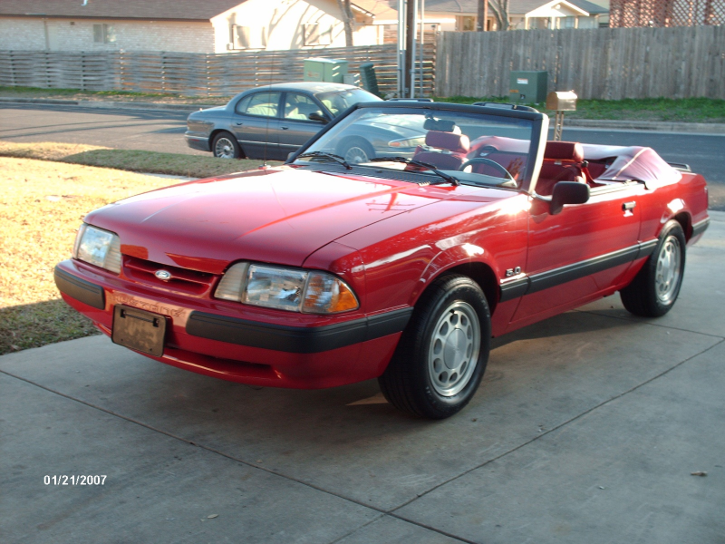 1990 Model of red convertible car-Ford Mustang, American racing car